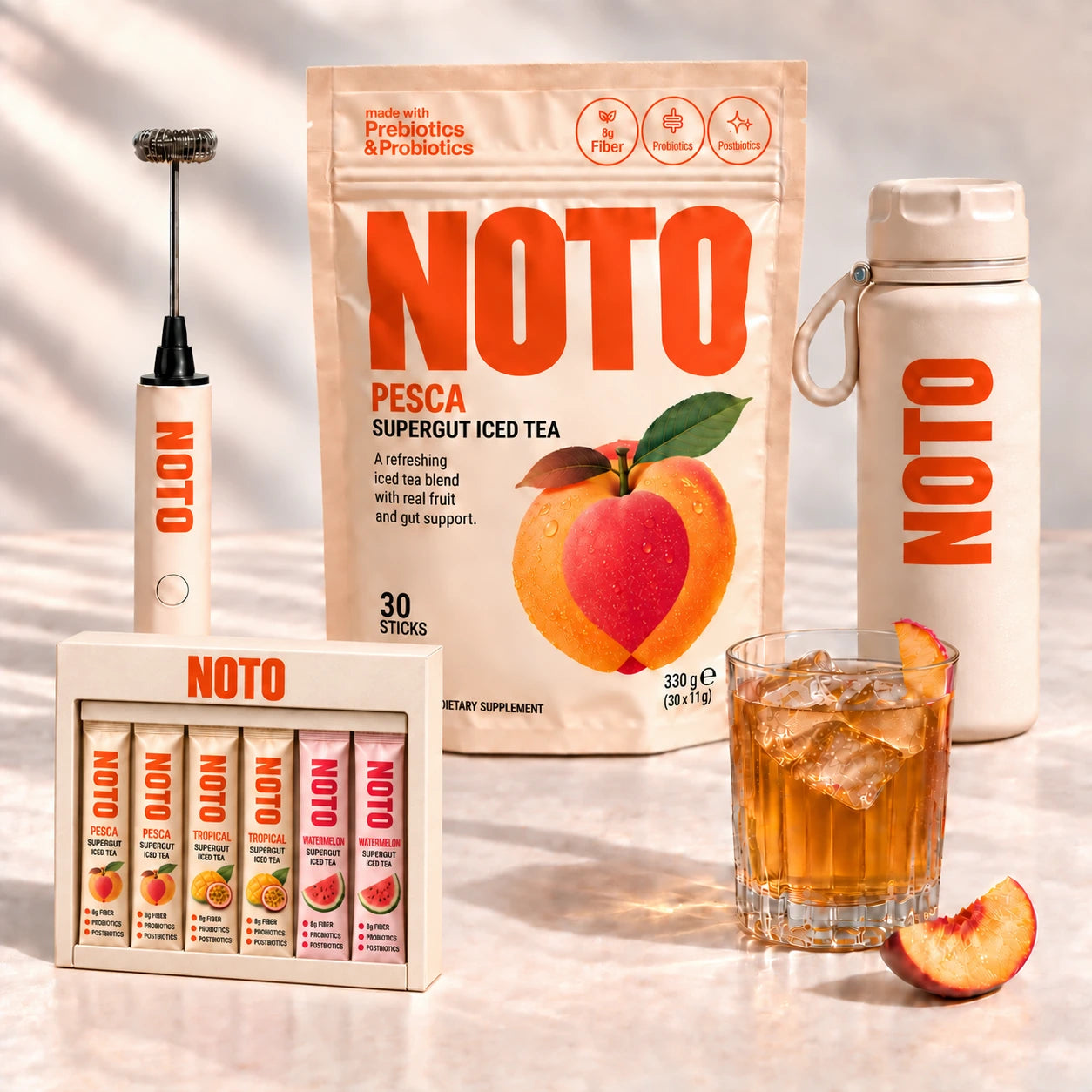 NOTO Peach iced tea with its welcome bottle, mixer and discovery pack